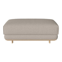 Light beige upholstered ottoman with subtle texture, featuring a minimalist design and natural wood legs.