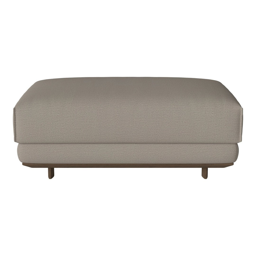 Light beige upholstered ottoman with clean lines and a minimalist design, featuring wooden legs.
