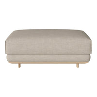 Light beige ottoman with a smooth fabric texture and minimalist design, featuring wooden legs for a modern look.