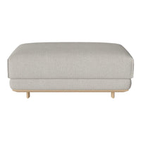 Light gray upholstered ottoman with a smooth, minimalist design and natural wood legs. Perfect for modern decor.