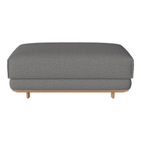 Gray upholstered ottoman with a textured pattern and natural wood legs, perfect for modern interiors.