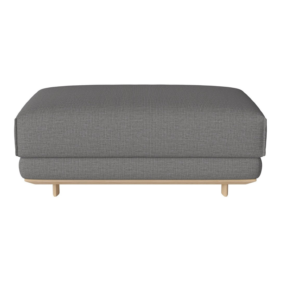 Gray upholstered ottoman with a subtle textured pattern and light wood legs. Perfect for modern living spaces.