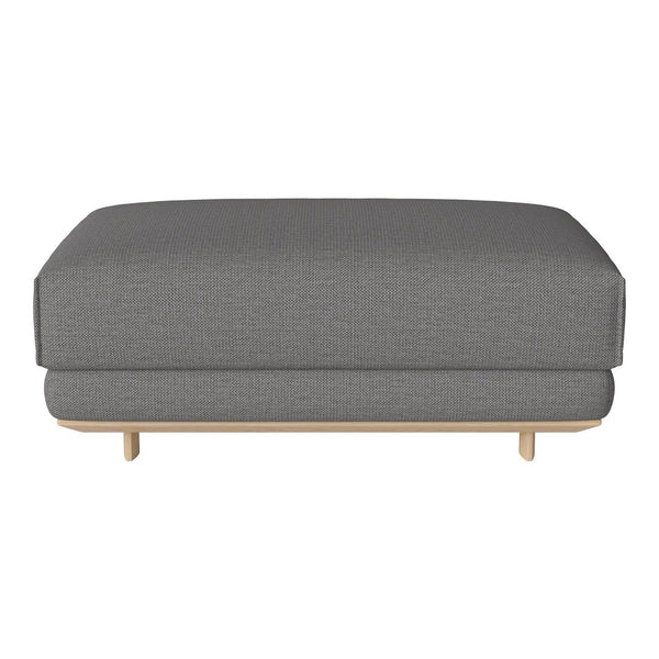 Gray upholstered ottoman with a subtle textured pattern and light wood legs. Perfect for modern living spaces.