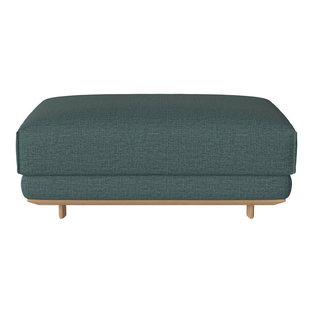 Teal upholstered ottoman with a subtle textured pattern and light wood legs, perfect for modern decor.