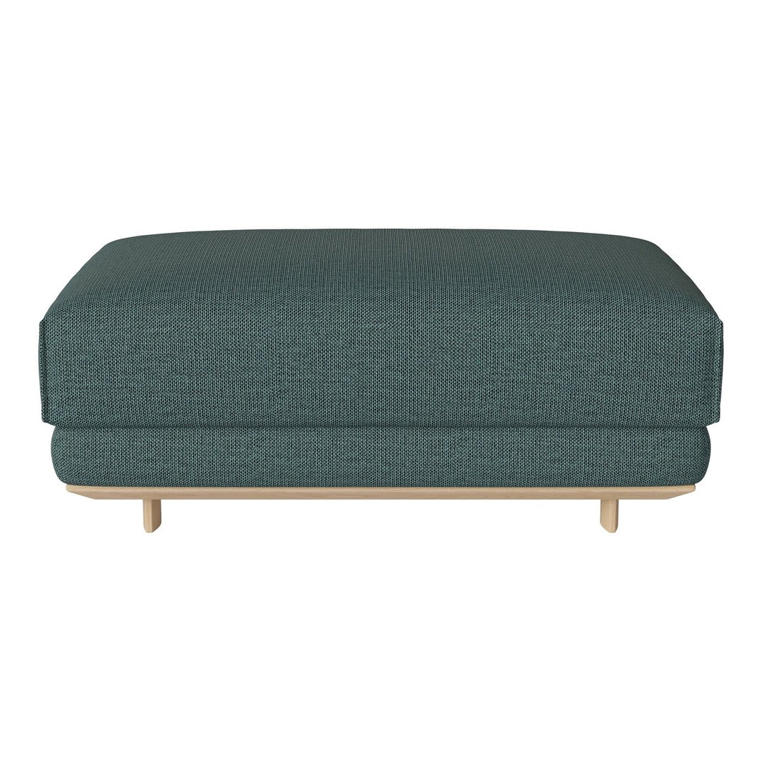 Teal upholstered ottoman with a subtle textured pattern and natural wood legs. Ideal for modern decor.