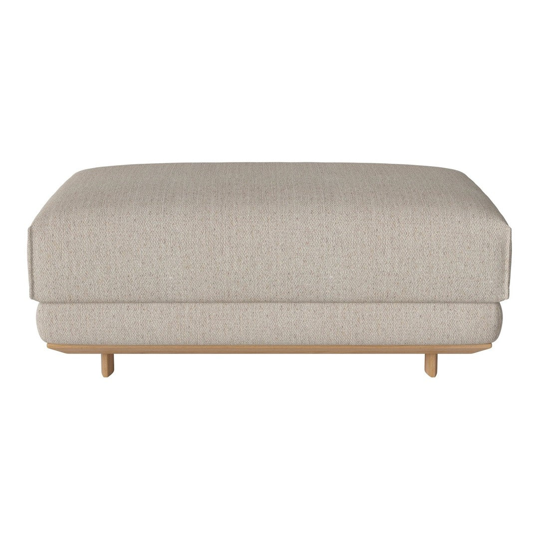 Neutral beige ottoman with a smooth texture and minimalist design, featuring light wooden legs for a modern touch.