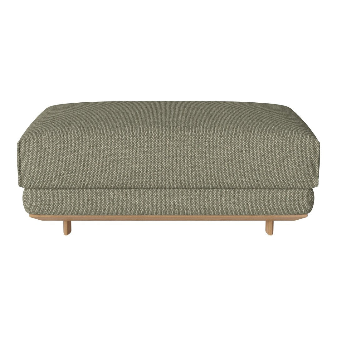 Olive green textured ottoman with a subtle pattern and light wooden legs for a modern touch.