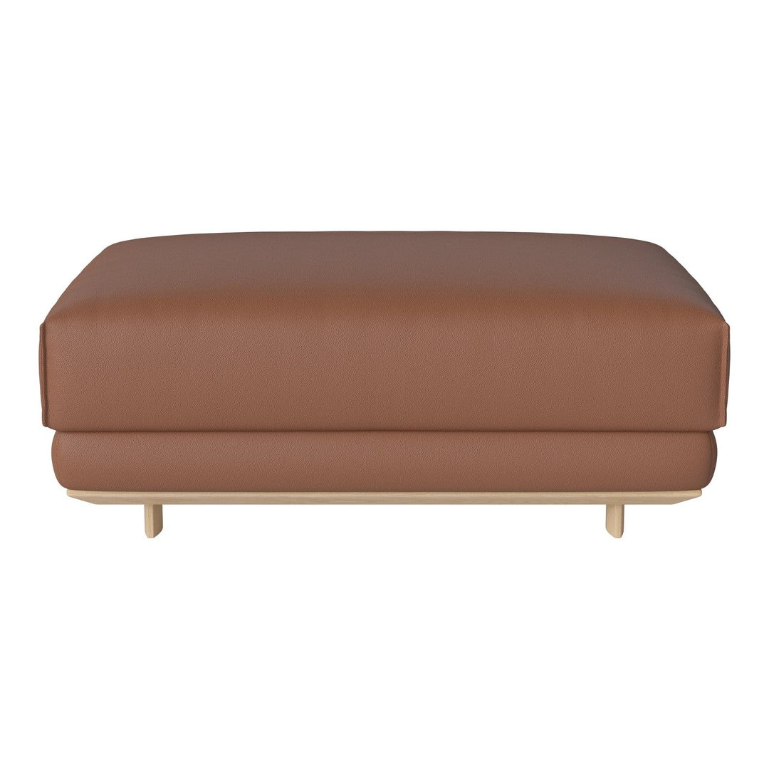 Brown leather ottoman with a smooth, minimalist design and light wooden legs, perfect for modern decor.