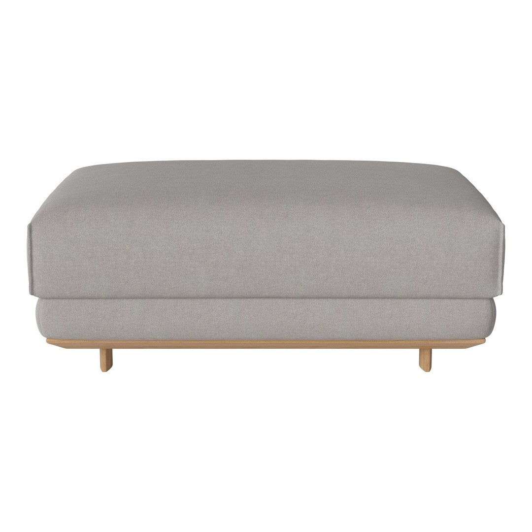 Light gray upholstered ottoman with smooth, minimalist design and natural wood legs. Perfect for modern decor.