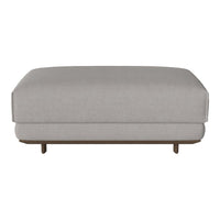 Light gray upholstered ottoman with a smooth, minimalist design and wooden base.