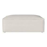 Textured cream-colored ottoman in a sleek, modern design, perfect for adding elegance to any space.