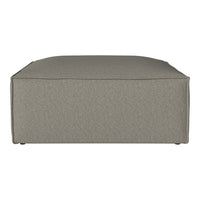 Gray upholstered ottoman with a smooth, textured fabric surface and clean, modern lines. Perfect for any living space.