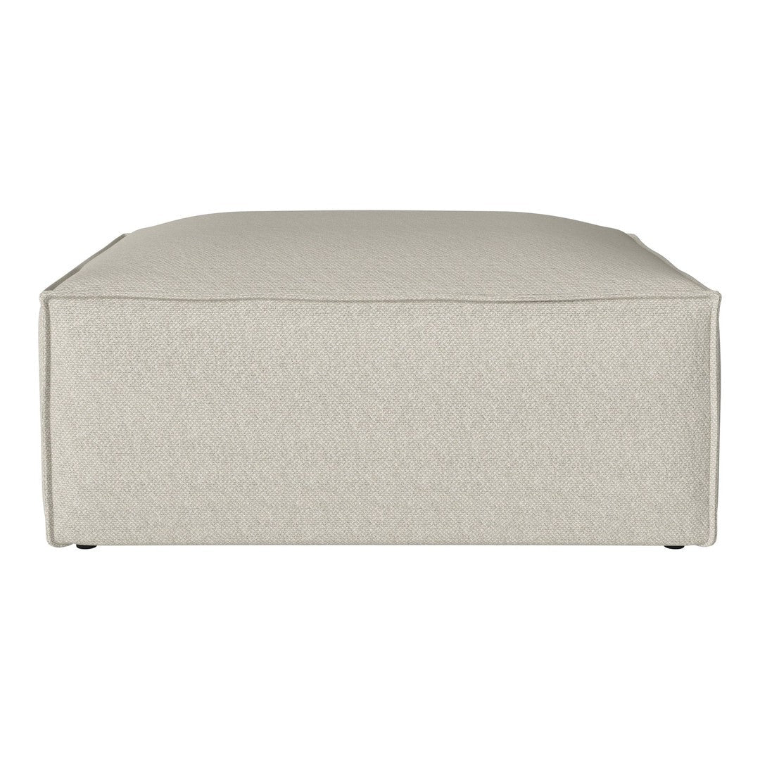 Light beige square ottoman with a textured fabric pattern and rounded edges, perfect for modern decor.