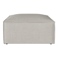Beige square ottoman with a textured woven fabric pattern. Simple and modern design for versatile home décor.