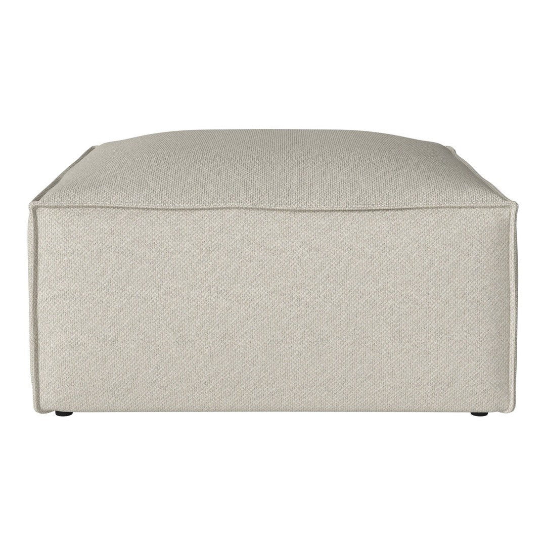 Beige textured square ottoman with a subtle pattern, perfect for modern home decor.