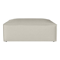 Light beige upholstered ottoman with a smooth, textured surface. Ideal for modern and minimalist decor.
