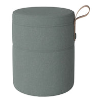 Round green storage ottoman with a textured finish and top handle for easy carrying.