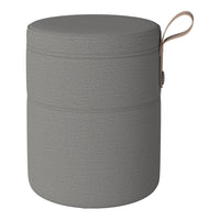 Gray textured storage container with a sleek round shape and a handy side handle. Ideal for organizing your space.