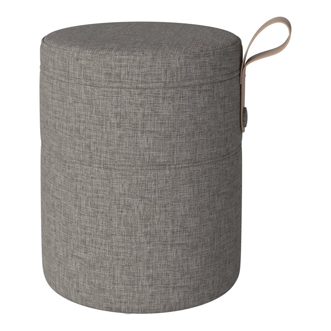 Gray fabric storage ottoman with a textured pattern and leather handle for easy transport.