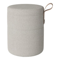 Round gray storage ottoman with a textured fabric pattern and a brown leather handle. Ideal for modern decor.