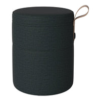 Dark green round storage stool with a textured pattern and a tan leather handle.