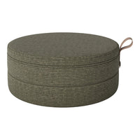 Round storage ottoman in textured olive green with a subtle striped pattern and a convenient carrying handle.