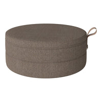 Round, textured pouf in a warm, earthy brown tone, featuring a subtle woven pattern and a convenient handle.