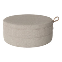 Round, beige cushion with a textured fabric pattern and side loop handle. Perfect for stylish seating.