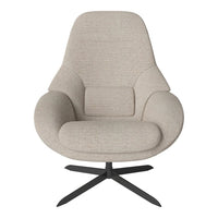 Beige upholstered chair with a soft texture, featuring a sleek black metal base and modern, minimalist design.