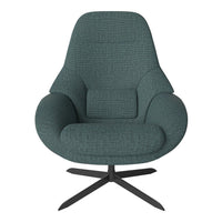 Teal upholstered chair with textured pattern and a sleek black base. Modern design for stylish decor.