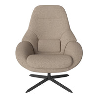 Beige boucle fabric armchair with a smooth, curved silhouette and a sleek, black base. Modern, cozy design.
