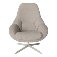 Beige upholstered chair with a smooth, textured surface and minimalist design. Ideal for modern interior decor.