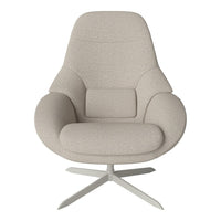 Beige upholstered chair with a smooth, curved design and minimalist pattern, featuring a sleek silver base.