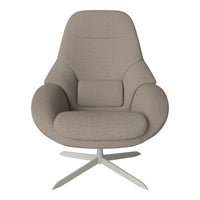 Modern beige chair with a textured upholstery and sleek silver base, featuring a smooth and curved design.