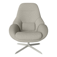 Light grey upholstered armchair with smooth, modern design and soft curves. Ideal for contemporary interiors.