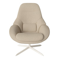 Beige boucle fabric armchair with smooth, rounded design and white metal base, perfect for modern decor.