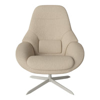 Beige textured armchair with a unique curved design and a sleek silver base, perfect for modern interiors.