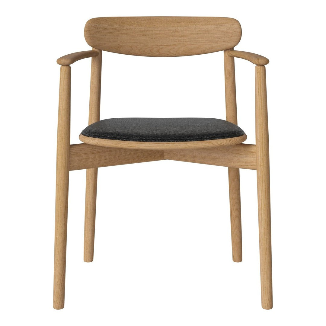 Natural wood chair with a light oak finish and a sleek black seat cushion, featuring simple, modern lines.