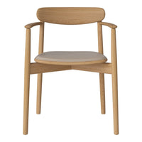 Light oak wooden chair with a natural finish and cream-colored cushion, showcasing a minimalist design.