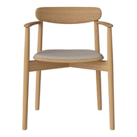 Light wood chair with a smooth finish and a textured gray fabric seat, featuring a minimalist design.