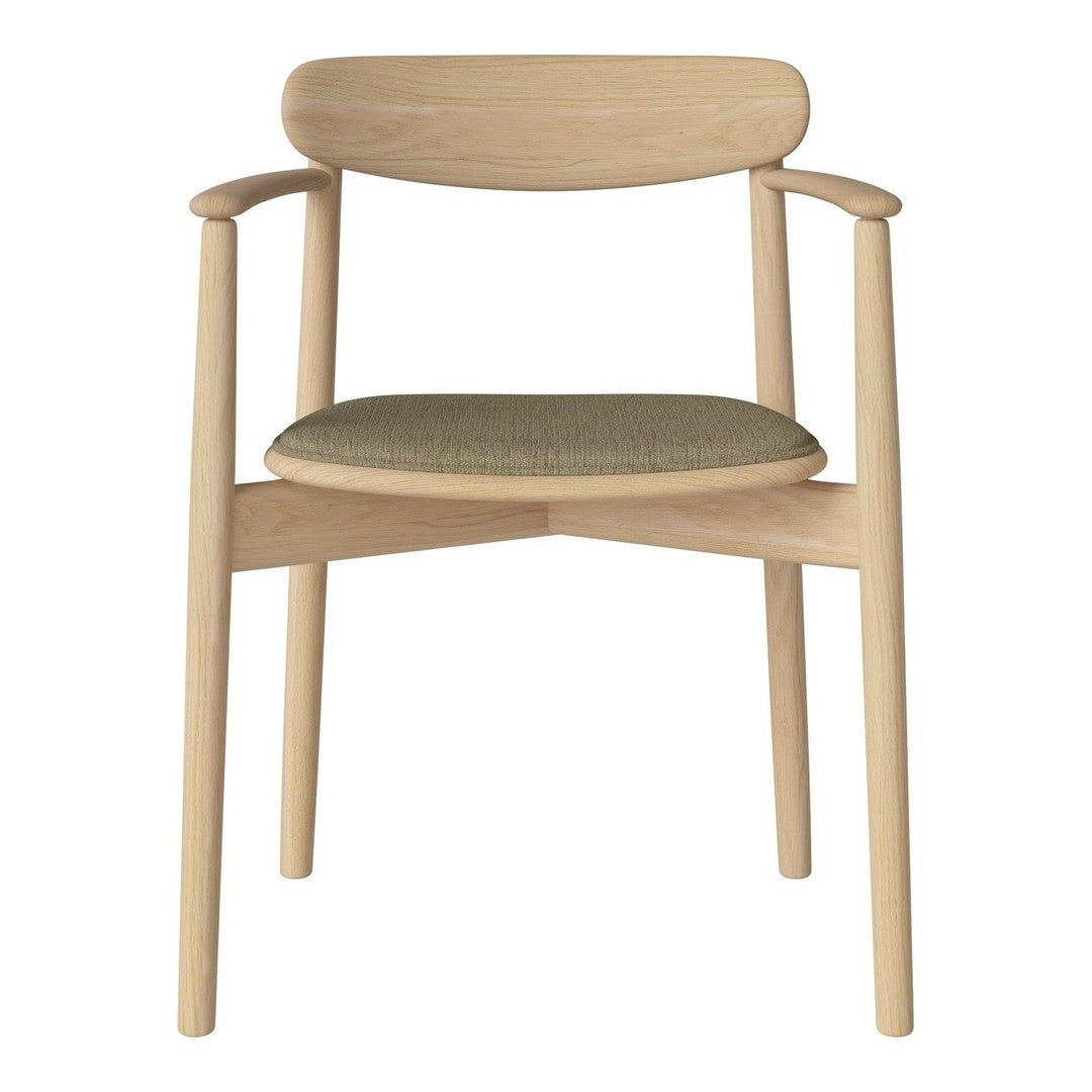Light wood armchair with a soft green upholstered seat and a minimalistic design, perfect for modern decor.