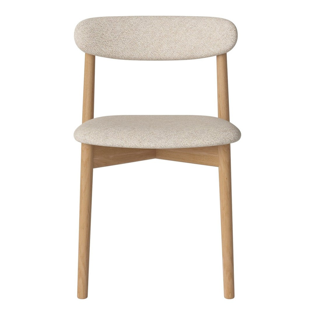 Beige upholstered chair with a minimalist design and natural wood legs, showcasing a soft texture and clean lines.