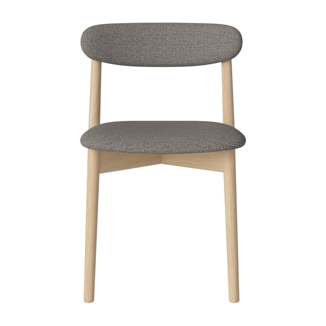 Gray upholstered chair with a minimalist design and natural wood legs. Perfect for modern decor.