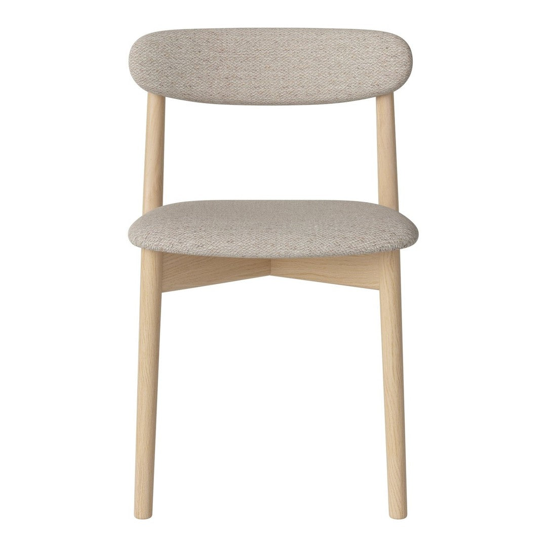 Light gray upholstered chair with a smooth texture and natural wood legs. Minimalist design ideal for modern decor.