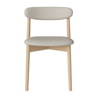 Neutral beige chair with a simple design, featuring light wood legs and a soft, textured, upholstered seat.