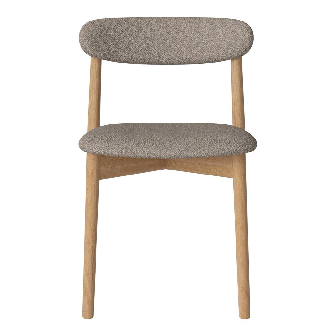 Minimalist chair featuring a soft grey upholstered seat and backrest with natural wood legs.