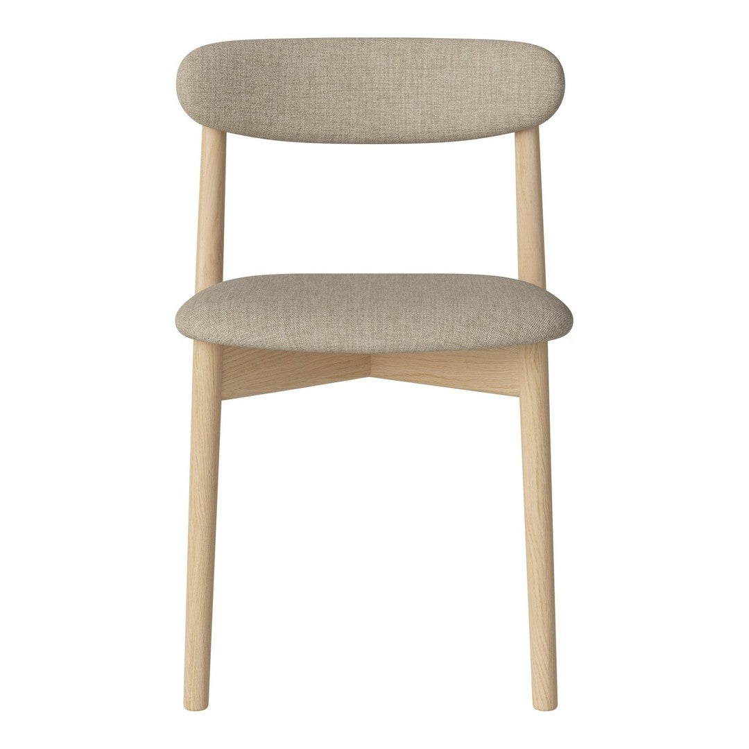 Beige upholstered chair with a smooth texture and natural wood legs in a minimalist design.