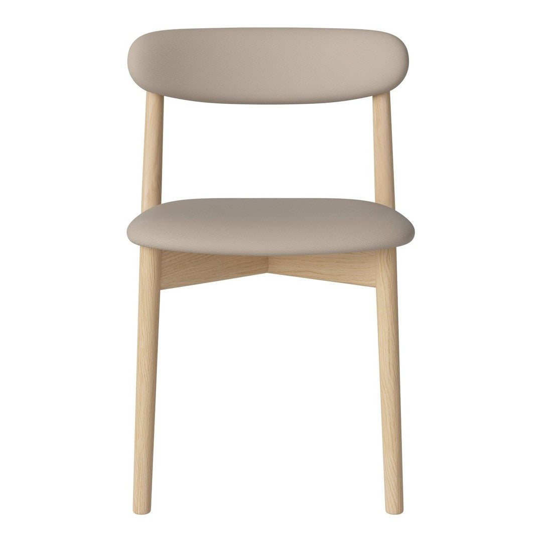 Minimalist chair in soft beige upholstery with natural wooden legs, perfect for modern decor.