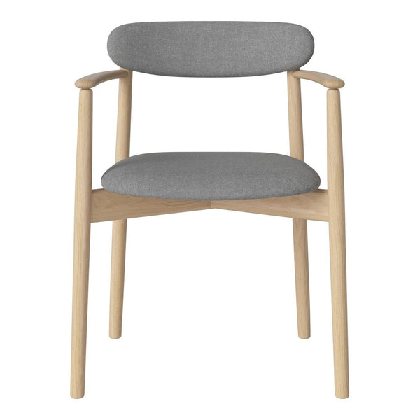 Minimalist grey upholstered chair with natural wood accents and a clean, modern design. Perfect for any decor.