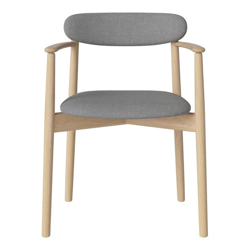Minimalist grey upholstered chair with natural wood accents and a clean, modern design. Perfect for any decor.
